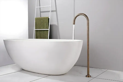 Freestanding Bathtub Faucets with a white shower tub