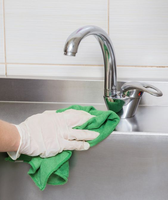 clean the kitchen sink and faucet